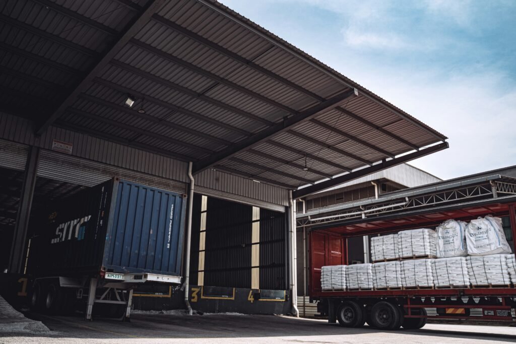 Commercial cargo being loaded into a semi truck for nationwide pickup in China