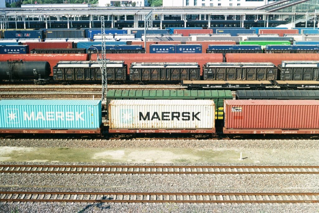 Rows of container freight trains at an intermodal rail logistics terminal