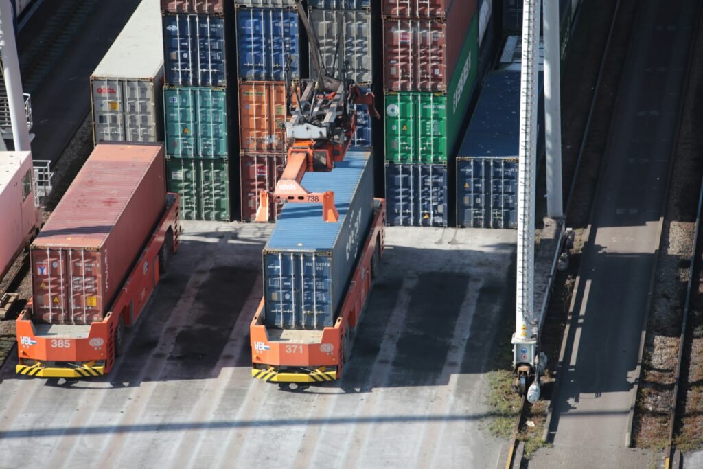 Container terminal gantry crane loading cargo during real port operations